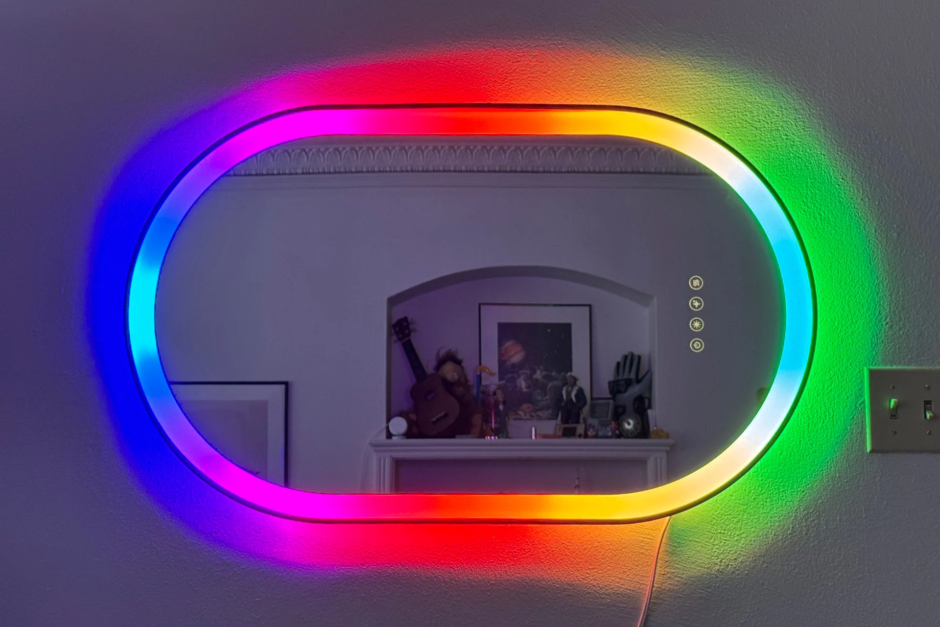The lifx Smar Mirror's LED ring displaying a rainbow of color.