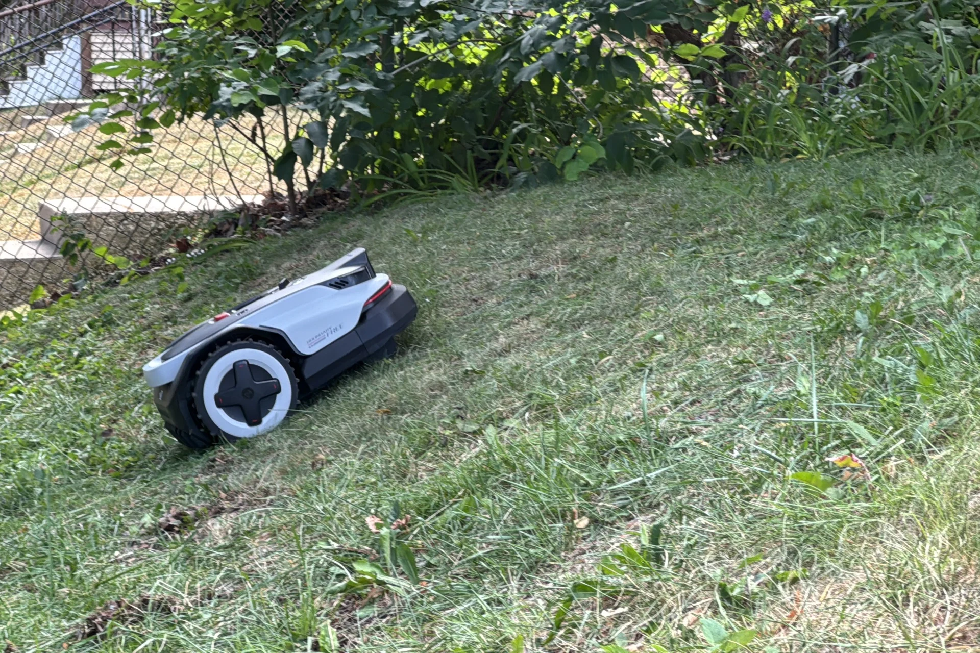 Image showing the Roborock Rockneo Q110H going uphill