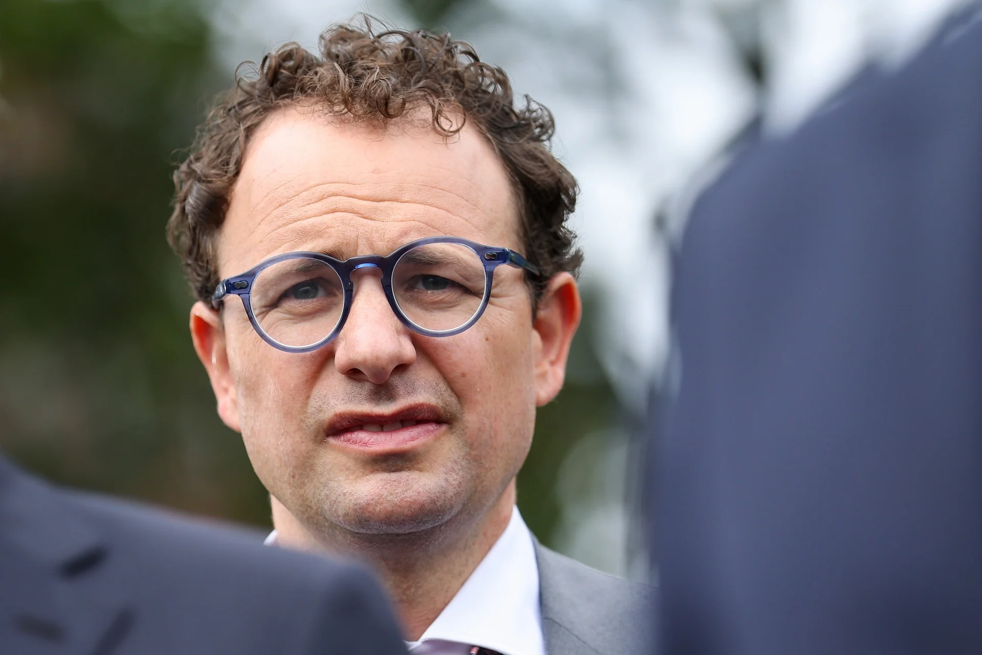 CEO of Anthropic Dario Amodei looks on as U.S. President Donald Trump holds a press briefing with AI executives following a meeting on artificial intelligence, outside the West Wing of the White House on September 29, 2026 in Washington, DC.